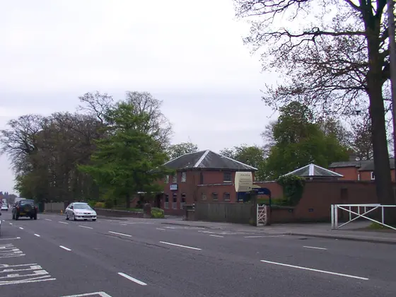 Ascot police station, across the road. The sign reads "Her Majesty's representatives' car park".