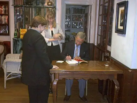 Dick Francis signs Shattered for a member of the Dick Francis Reading Group.